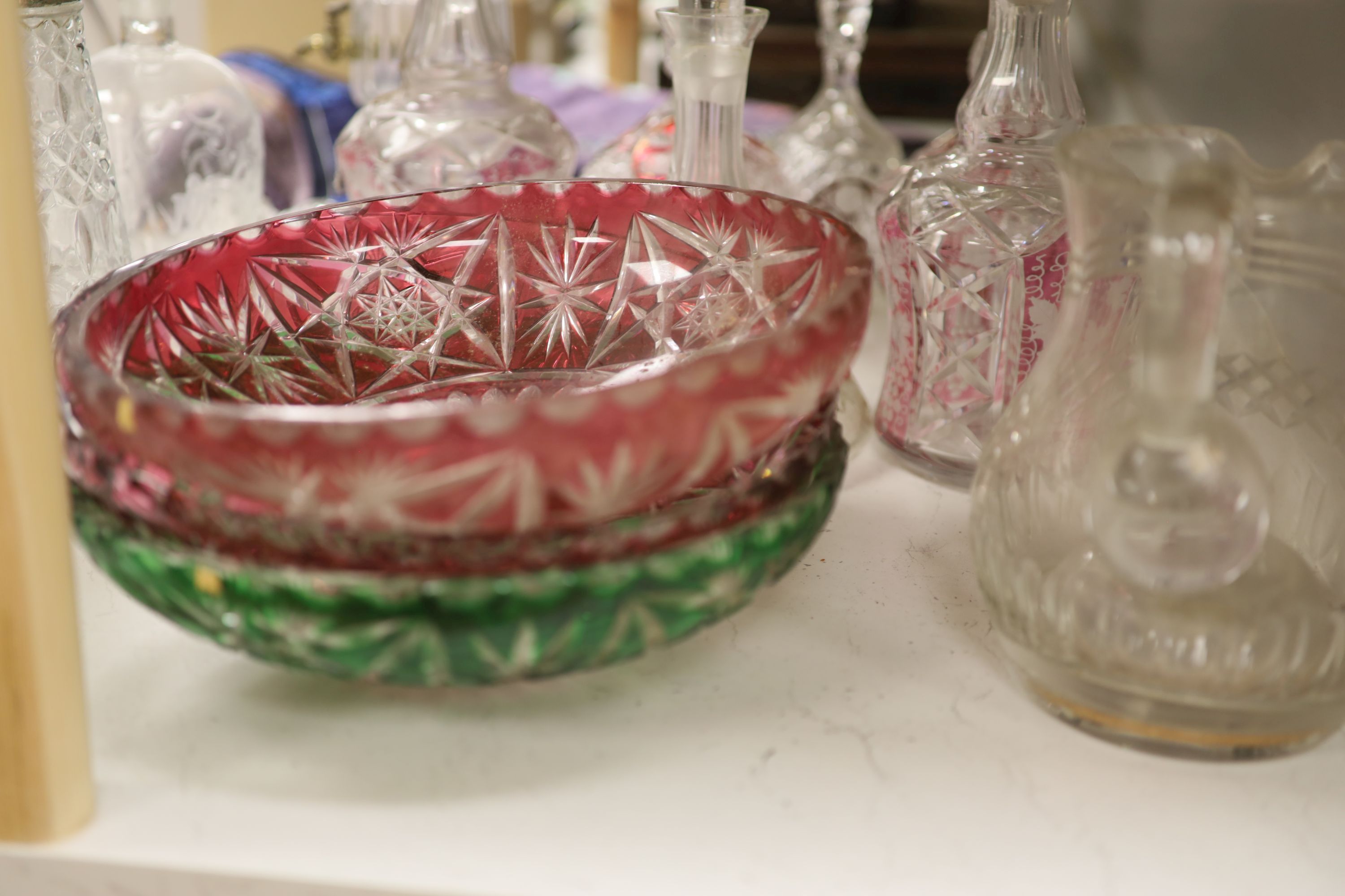 A quantity of mixed, cut, etched and overlaid glass, tallest 54cm